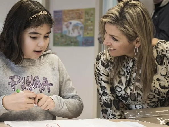 Queen Maxima of The Netherlands visited the IMC Weekendschool in Haarlem. Queen Maxima wore Natan Dress