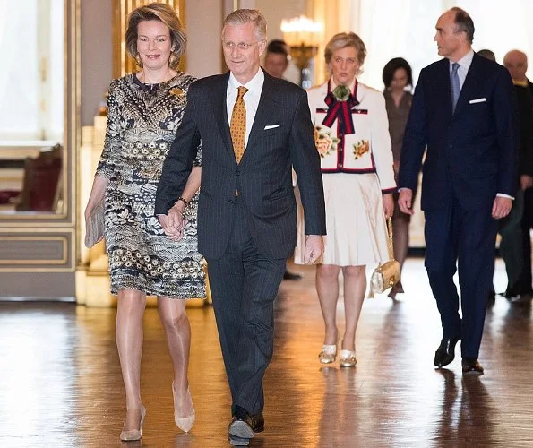 Queen Mathilde and Princess Astrid wore Dries Van Noten print dress, A Bag with a Story Clutch Tikli Jewelry earrings