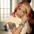 R and B singer,Keyshia Cole charged for assault following incident in Birdman's house