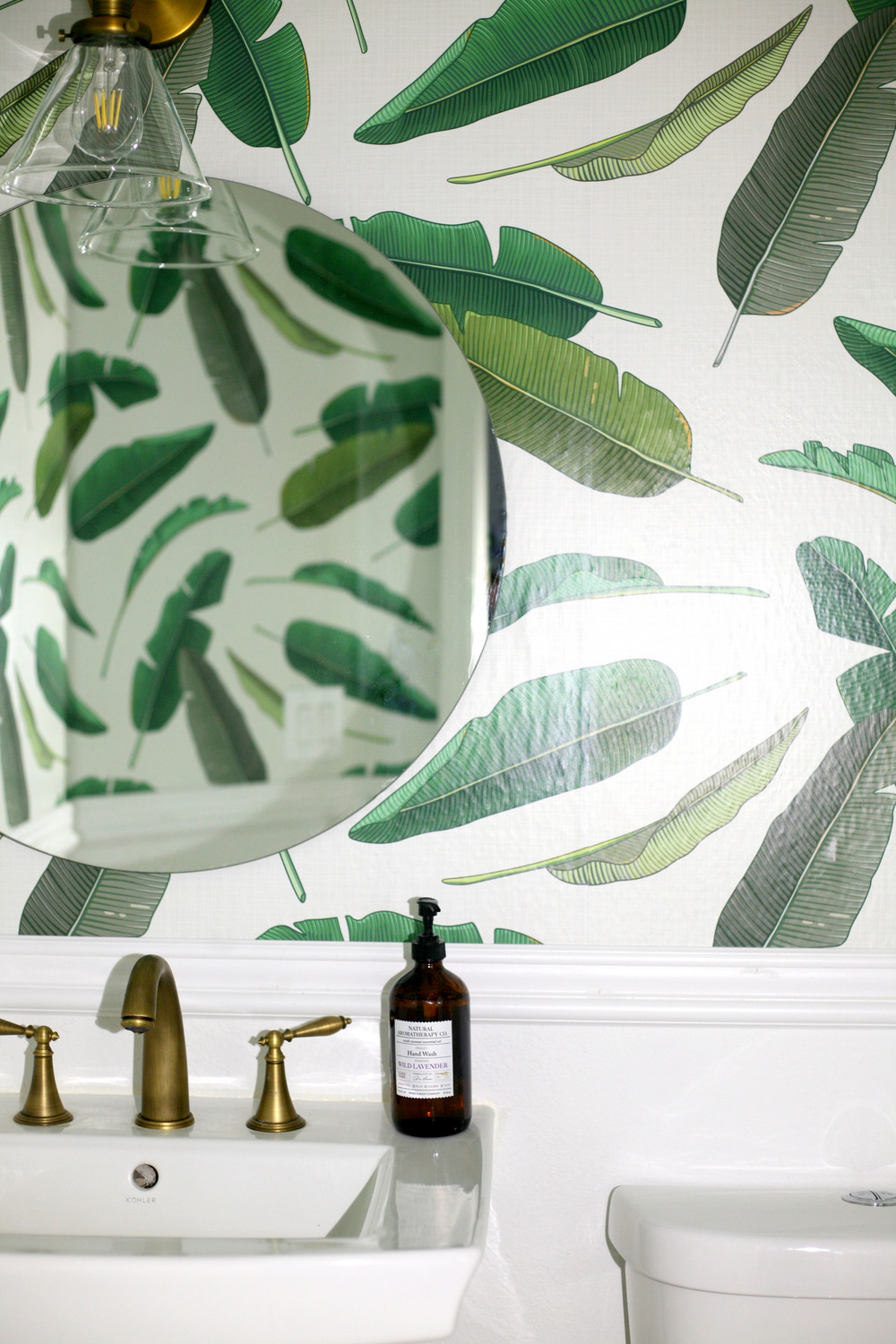 Removable wallpaper in the downstairs powder room and Walls Need Love