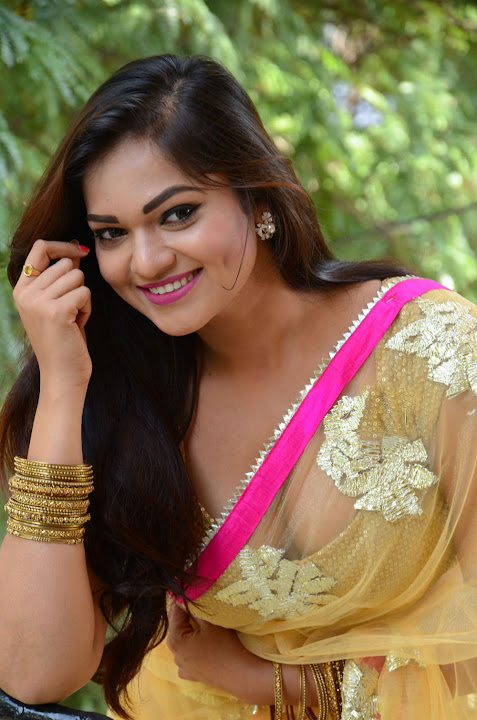 Ashwini Cleavage in Yellow Saree