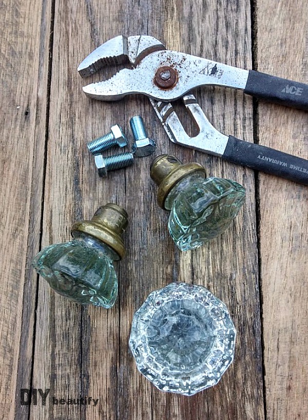 I turned a few pieces of molding and some antique glass door knobs into a stunning door knob hanger. Get the full tutorial at DIY beautify.
