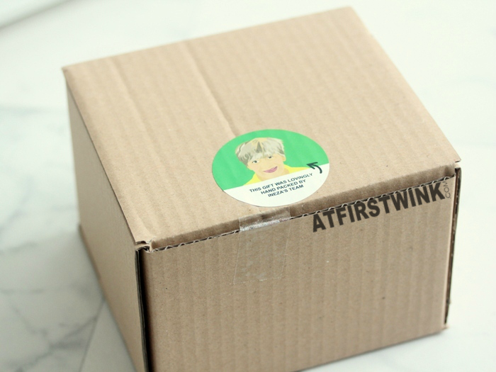 Lush carton box with sticker drawing of the one that packed it