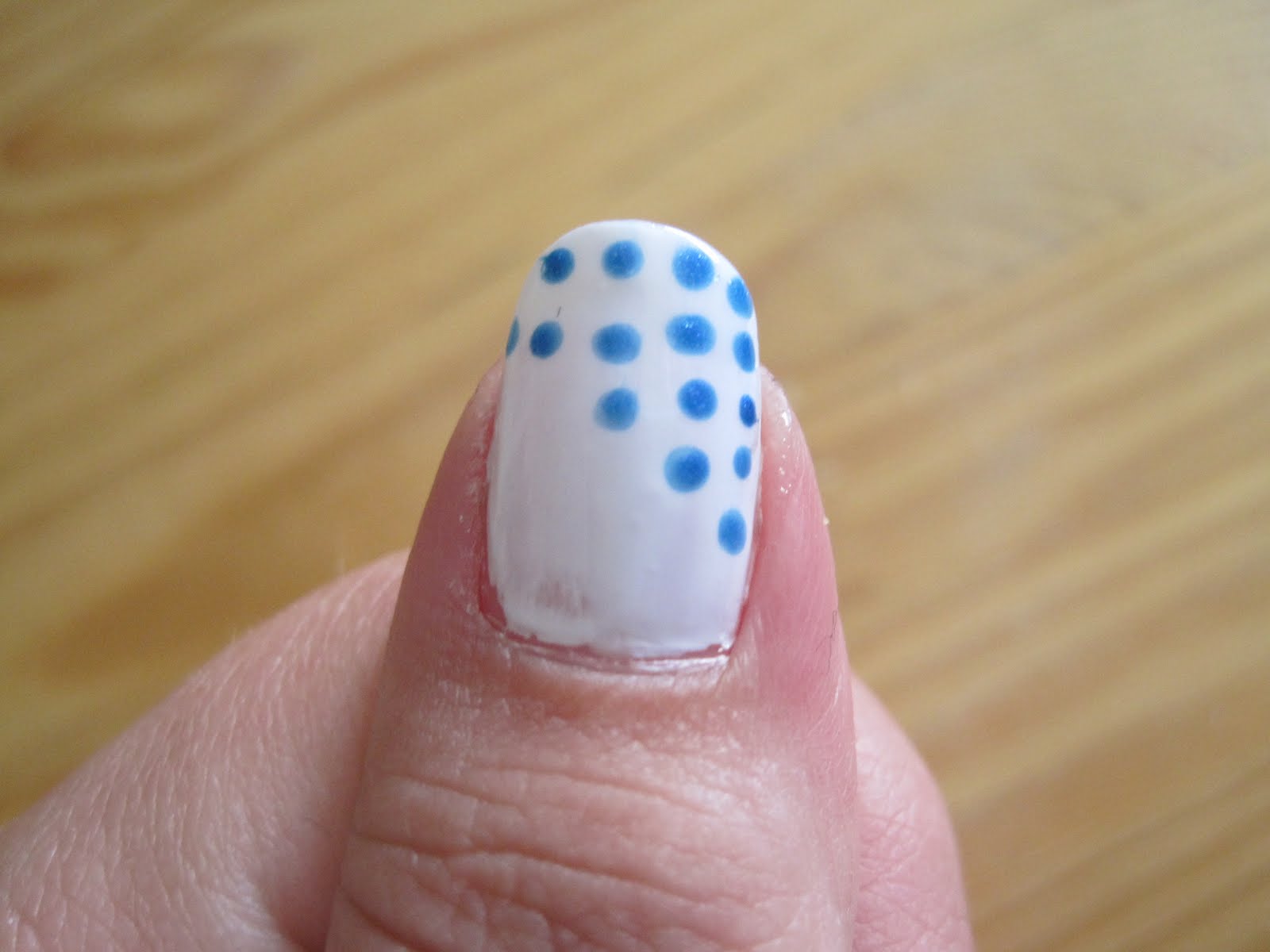 dragon nails & design white with blue dots