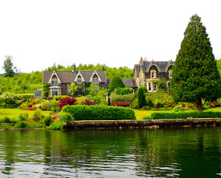 Lakeside Homes from Boat Trip on Lake Windermere Lake District England Great Britain