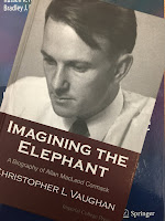 Imagining the Elephant: A Biography of Allan MacLeod Cormack, by Christopher Vaughan, superimposed on Intermediate Physics for Medicine and Biology.
