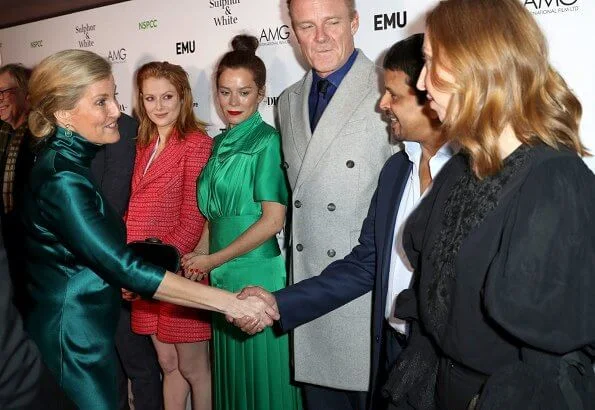 The Countess of Wessex wore a new silk-satin midi dress by Galvan London. BAFTA nominated director Julian Jarrold