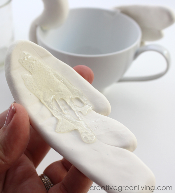 how to attach the swan wings to the tea cup
