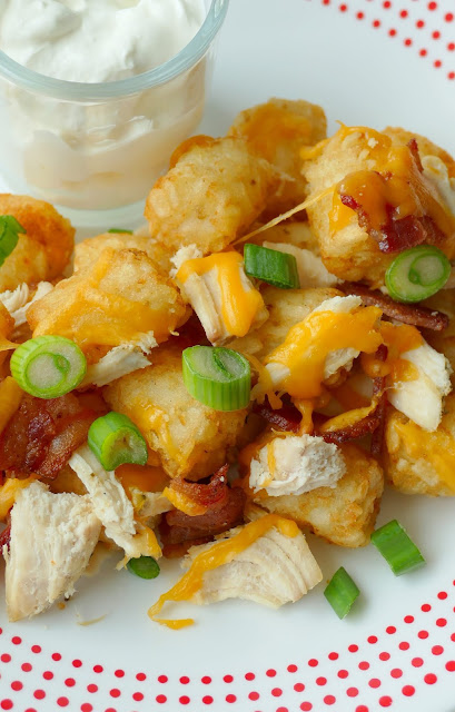 Cheesy Chicken and Bacon Tater Tots Recipe from Hot Eats and Cool Reads! This easy and delicious appetizer or dinner is kid approved and the adults love it too! Great for parties or any other occasion! 