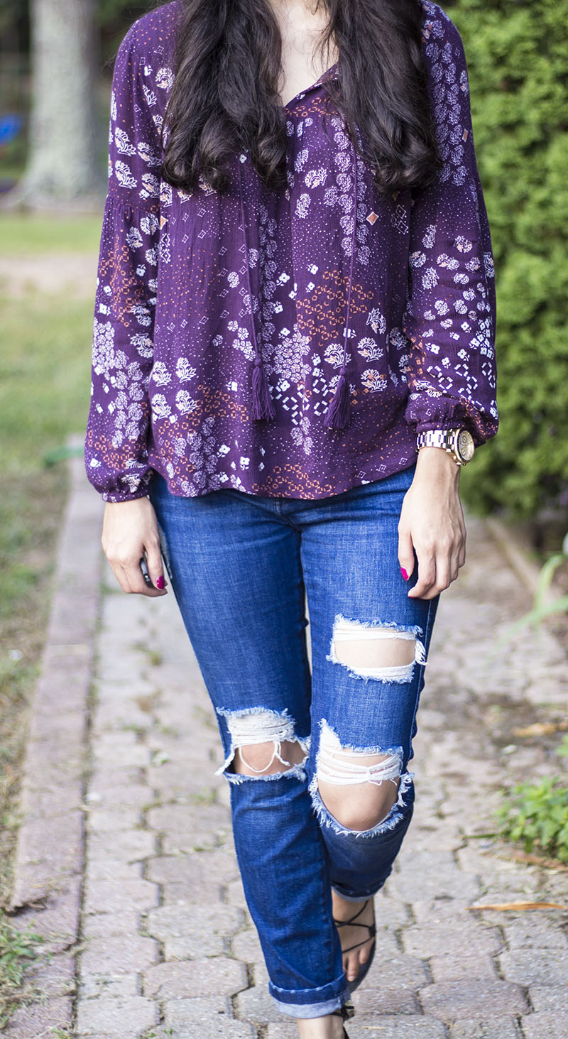 flowy print blouse and ripped jeans outfit