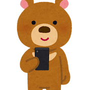 スマートフォンを使う熊のキャラクター
