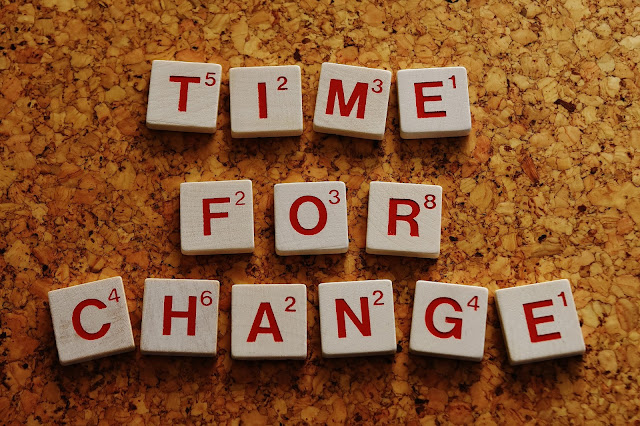 time for change spelled with letters from a boardgame