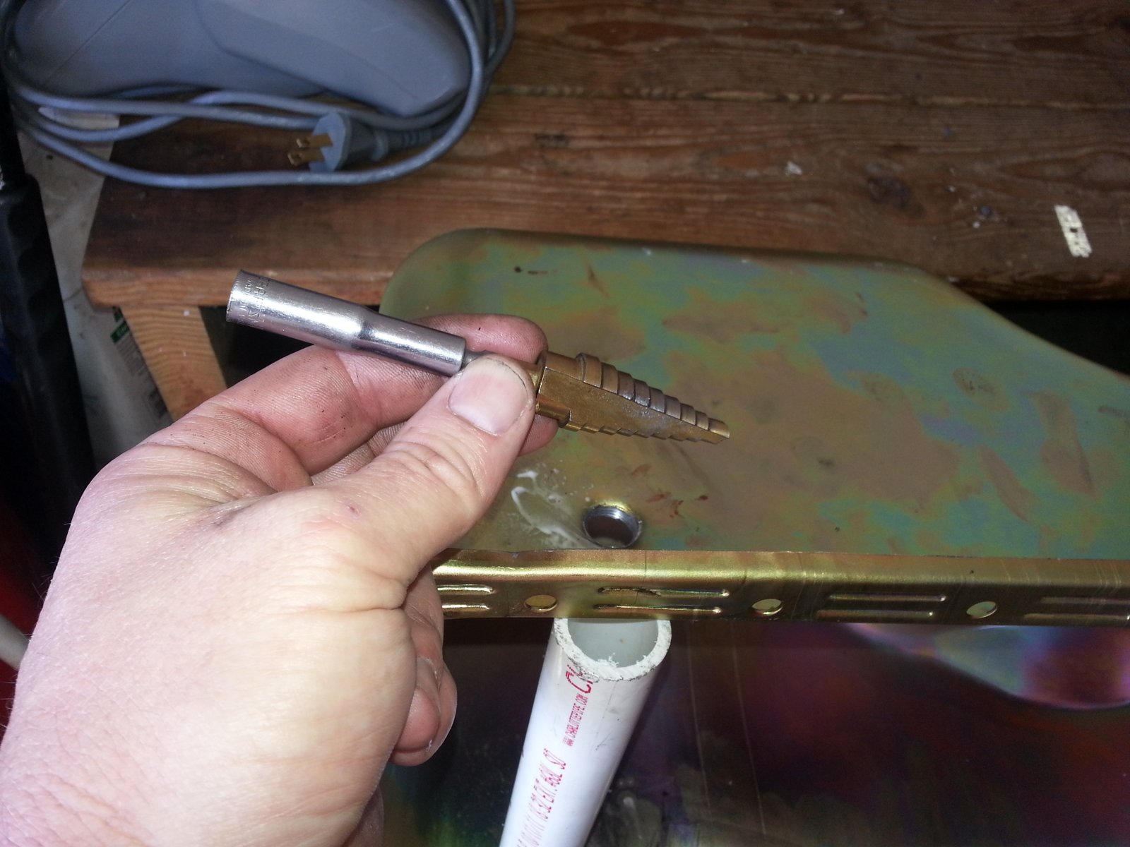 How to punch a hole in your oil pan for a Vortech Supercharger