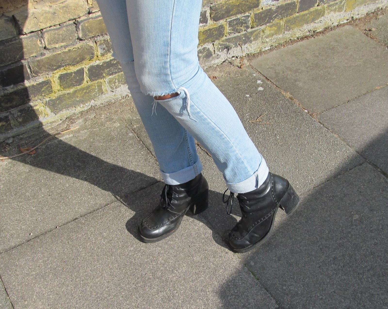 Ripped jeans, black boots | Charlie, Distracted