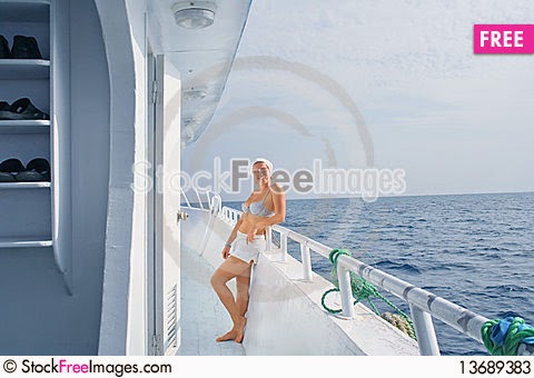 A young woman travel on the yacht