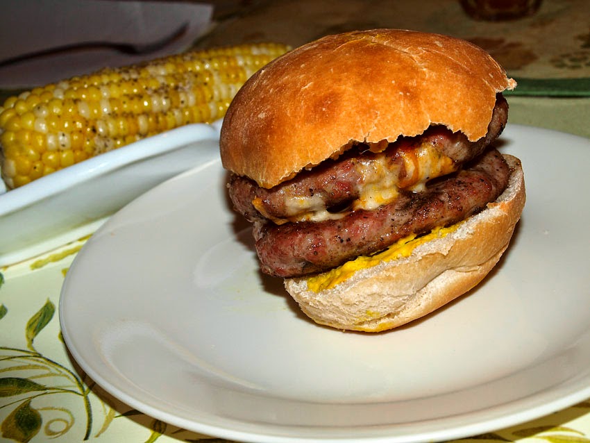 Pellet Smoker Cooking Brat Burgers and Corn on the Cob