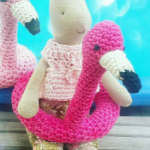 https://creating-time.com/2017/08/14/flamingo-swim-ring-by-ella_makes-free-crochet-pattern/