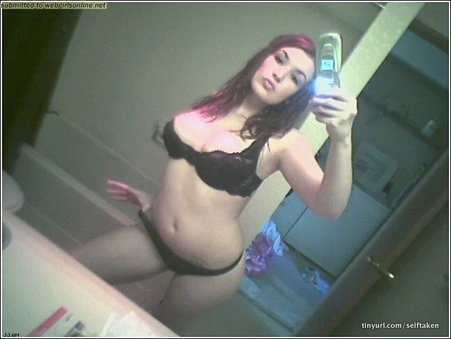Sexy pose teen selfie with old phone