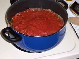 Add crushed tomatoes