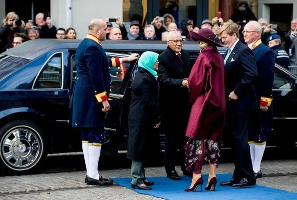 Dutch Queen Maxima wore Natan coat and Natan Pumps and she wore Saloni floral satin dress