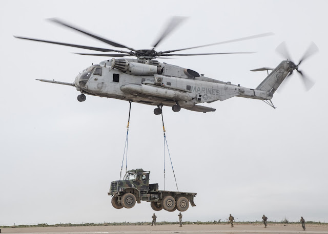 SNAFU!: CH-53E conducts helo-lift of MTVR...Pics by Lance Cpl. Clare ...