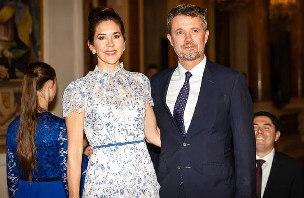 Princess Marie wore a metallic tulle midi dress by Christopher Kane. Crown Princess Mary wore a print lace dress by Elsa Adams