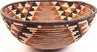Isiquabetho African Zulu baskets are large bowl shaped baskets used for gathering and carrying harvested foods and every day materials.