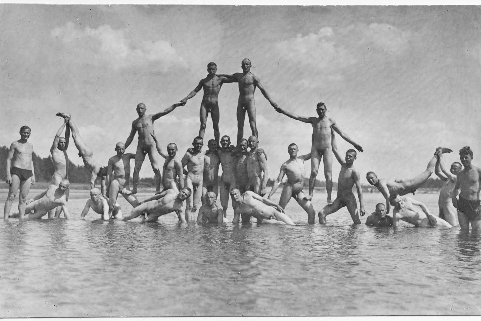 Vintage military naked pose for the camera.