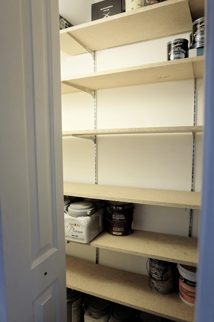 finished shelves in basement closet