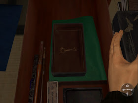 The small box in Iwao's room that contains a key.