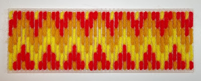 Multi-colored flame stitch sample