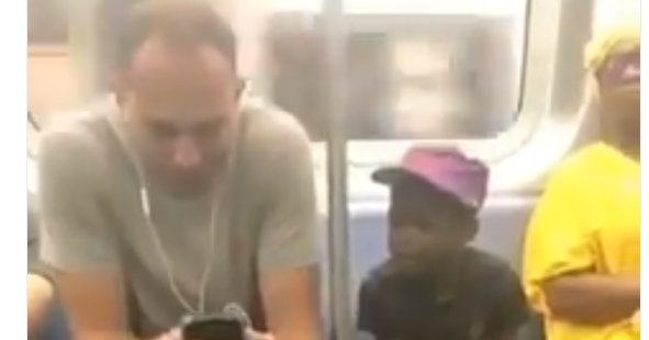 [VIDEO] WHITE MAN STOLE THE HEART OF MANY FOR HIS KIND ACT AFTER HE NOTICED THE YOUNG BLACK BOY SITTING NEXT TO HIM FASCINATED BY HIS PHONE