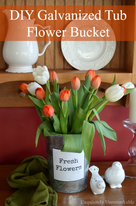 Add A Label To An Old Galvanized Bucket To Create A Flower Tub