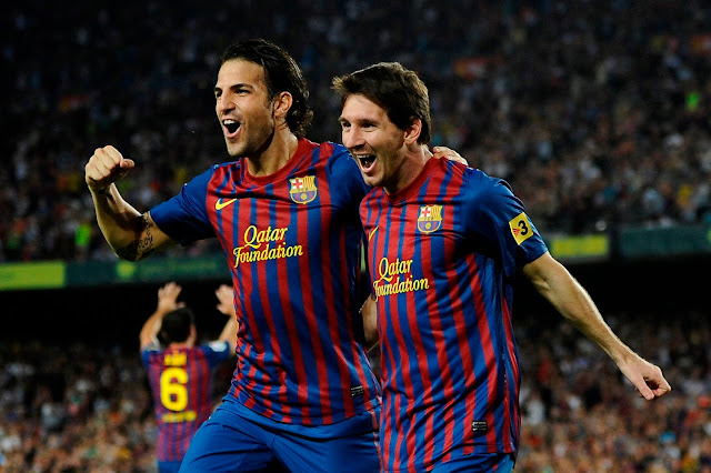 Lionel Messi and Cesc Fabregas
