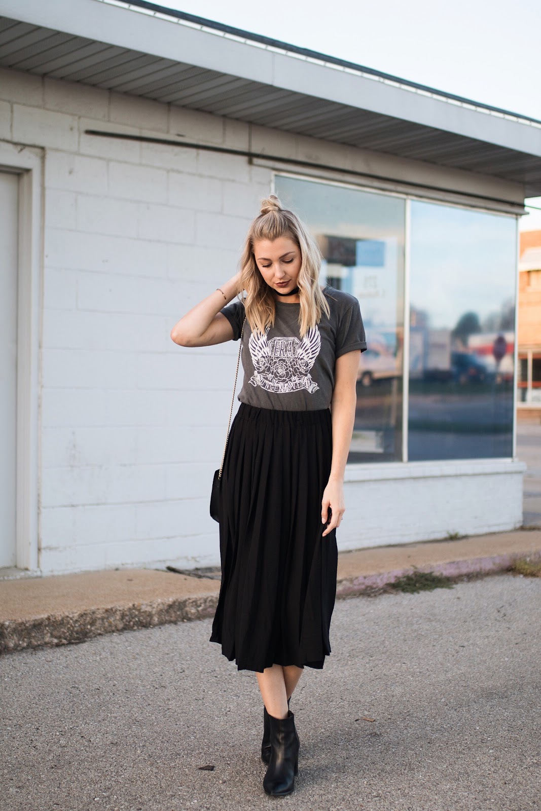 Black midi skirt styled casually