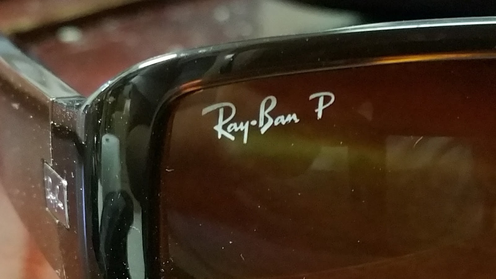 ray ban p logo on lens