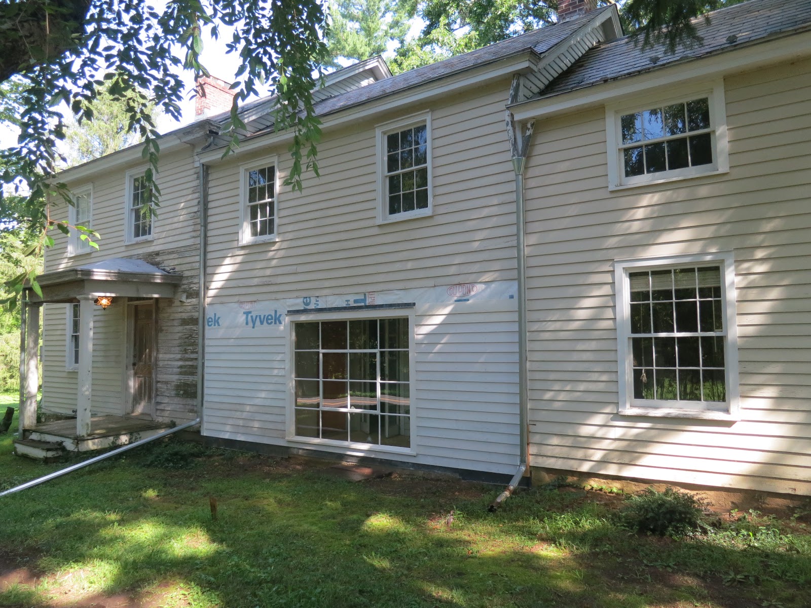 An Old Farm Replacing Old Clapboard Siding