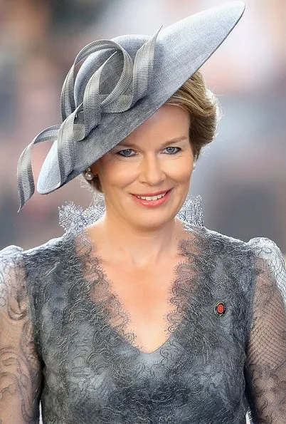 Kate Middleton wore Alexander McQueen cream coatdress. Anne Grand-Clement clutch, Balenciaga pearl earrings. Mathilde Natan lace dress