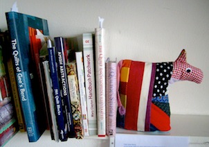 my lovely quilt-books and a "bookie"