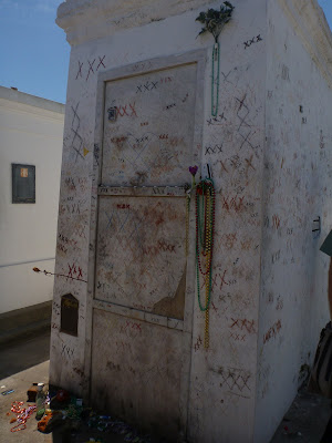 Voodoo Practitioners or Tourists at Marie Laveau Tomb?
