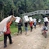 Babinsa Berjalan Kaki Kawal Logistik Pemilu Di Kaki Pegunungan Maratus