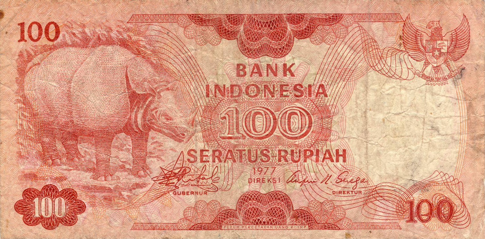 Uang Kertas Rp 100 Seratus Rupiah Indonesia Bergambar Badak Sedangkan