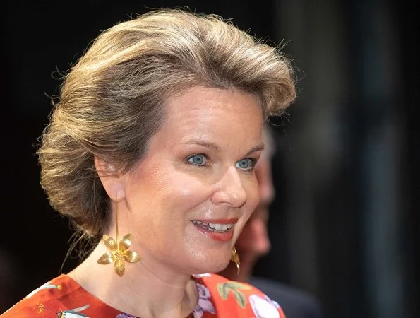 Queen Mathilde wore Erdem Venice Silk Satin Gown and Delphine Nardin Gold leaf earrings at fundraising gala in Antwerp
