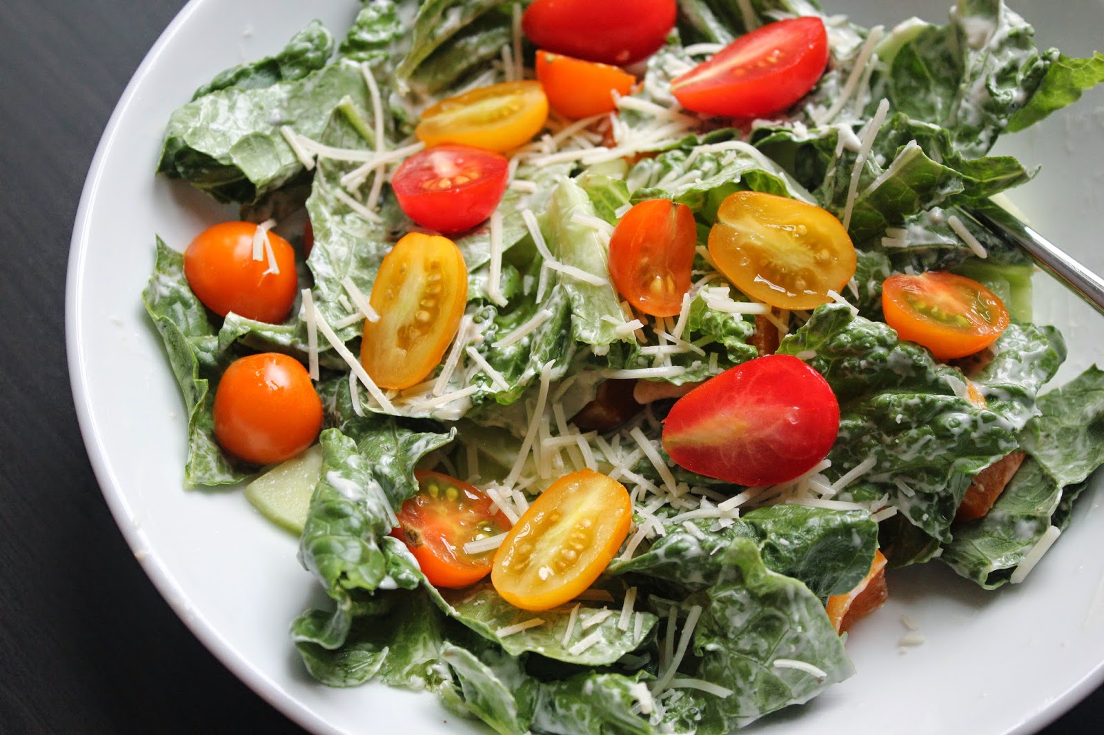 Caesar salad with tomatoes from the garden