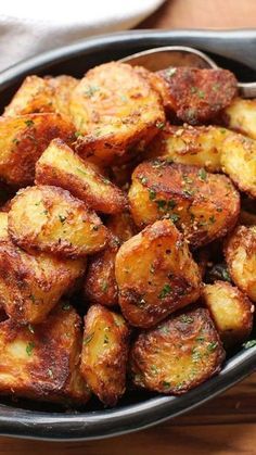 The Best Roast Potatoes Ever Recipe | This recipe will deliver the greatest roast potatoes you've ever tasted: incredibly crisp and crunchy on the outside, with centers that are creamy and packed with potato flavor. I dare you to make them and not love them. I double-dare you. #thanksgiving #thanksgivingrecipes #thanksgivingdishes #seriouseats #recipes #thanksgivingsidedishes #potatorecipes