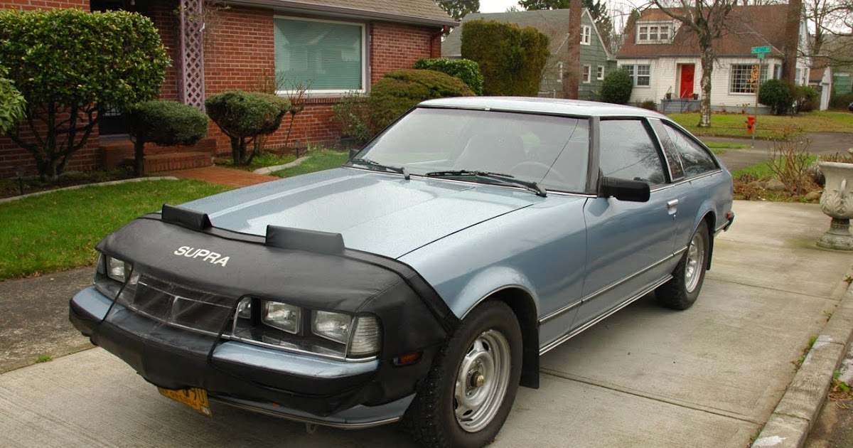 OLD PARKED CARS.: 1981 Toyota Celica Supra.