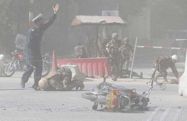 fotos niños y periodistas muertos  triple atentado Kabul, Afganistán,