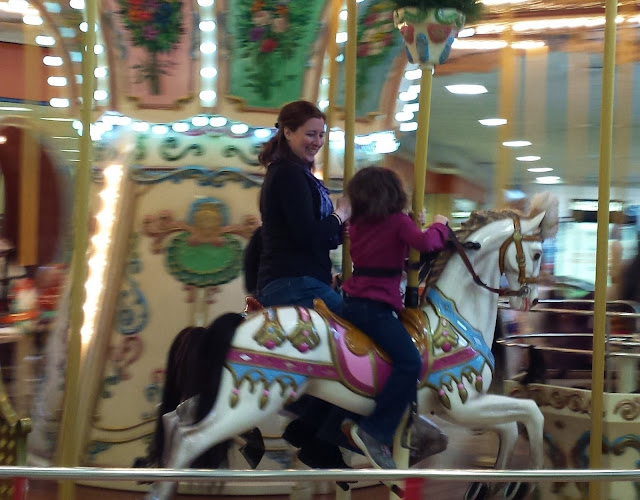 riding a carousel with William and Adelaide