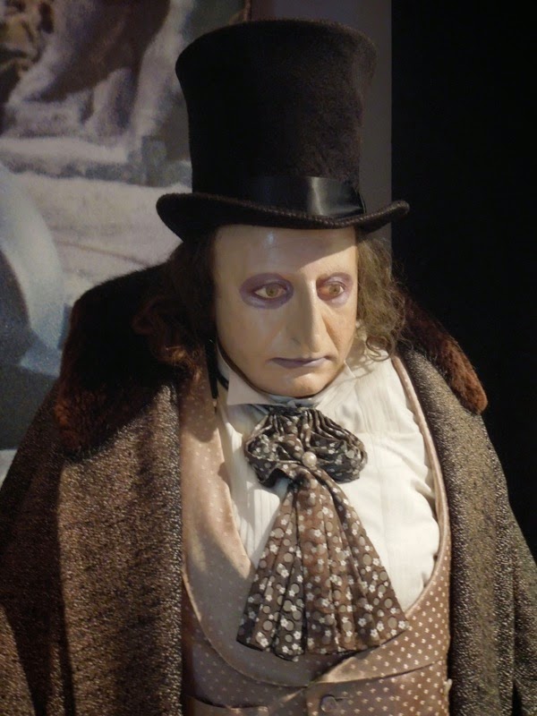 Hollywood Movie Costumes and Props: The Penguin costume worn by Danny DeVito  and props from Batman Returns on display...