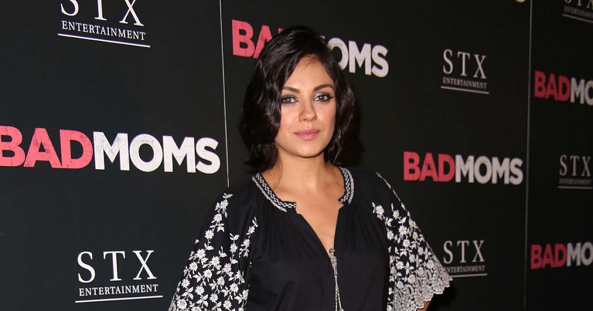 Mila Kunis dresses baby bump in jumpsuit for 'Bad Moms' NYC premiere